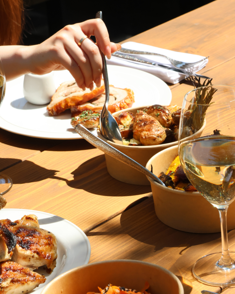 AL 'fresco dining a picture of someone plating their food outside